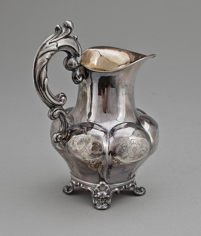 GRÄDDKANNA, silver, nyrokoko, Johan Olof Östlund, Gällivare 1865. Vikt ca 168 g.