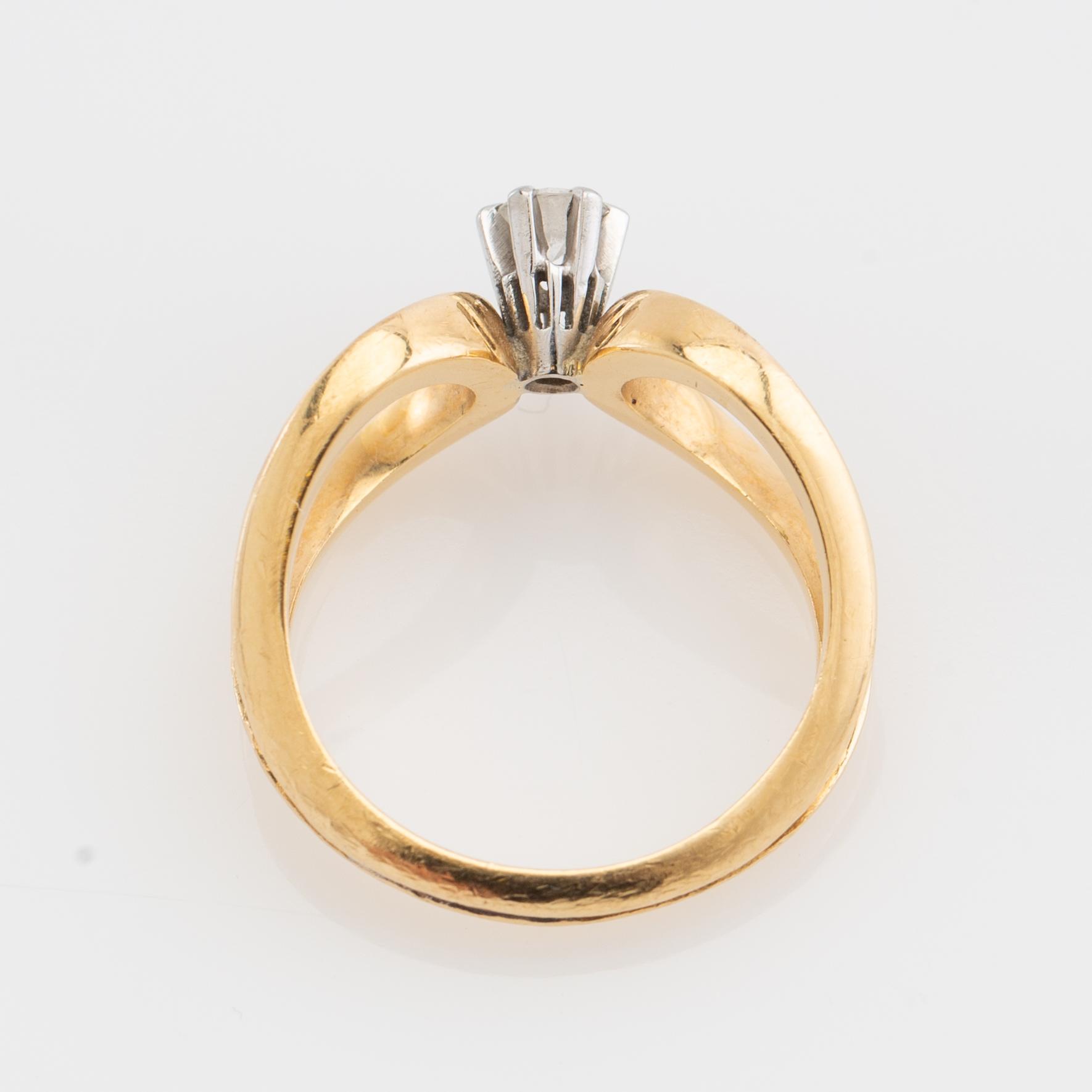 Ring, fantasy model, 18K gold with diamond.