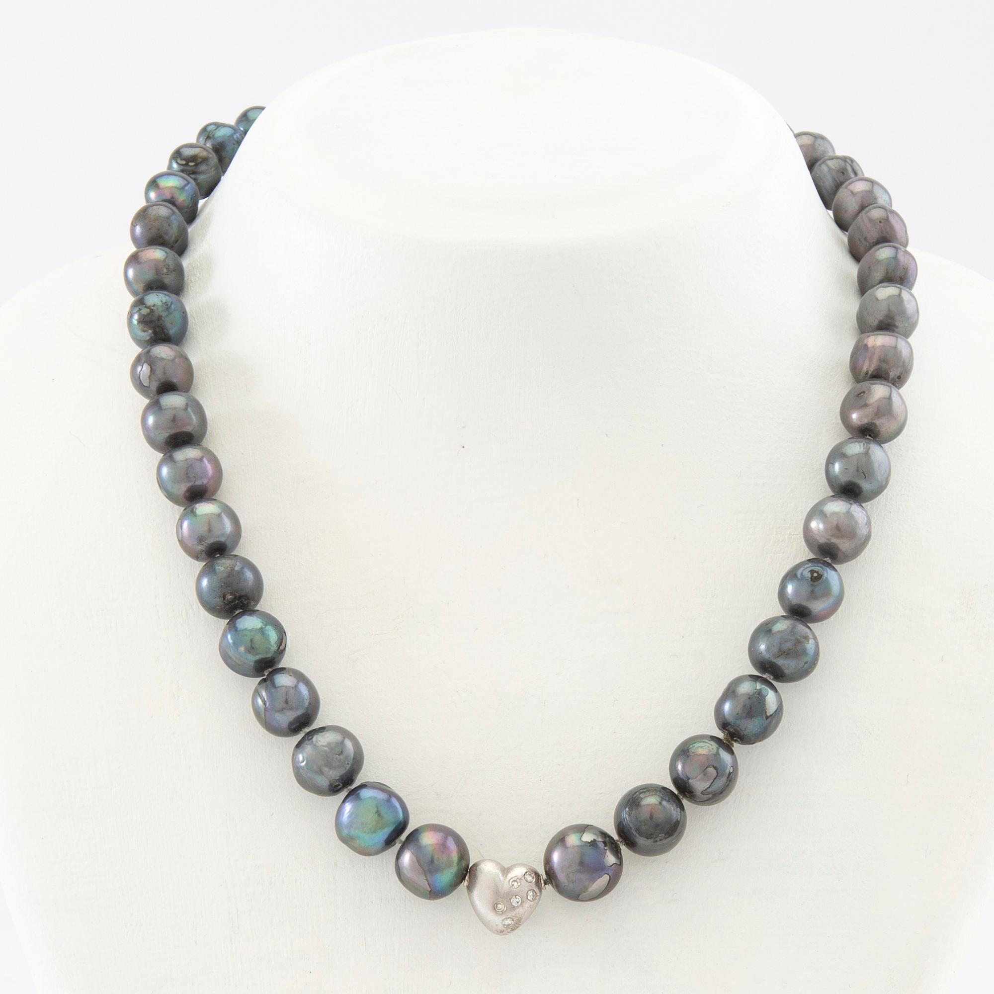 Ole Lynggaard, Lock 18K white gold with accompanying necklace of cultured pearls.
