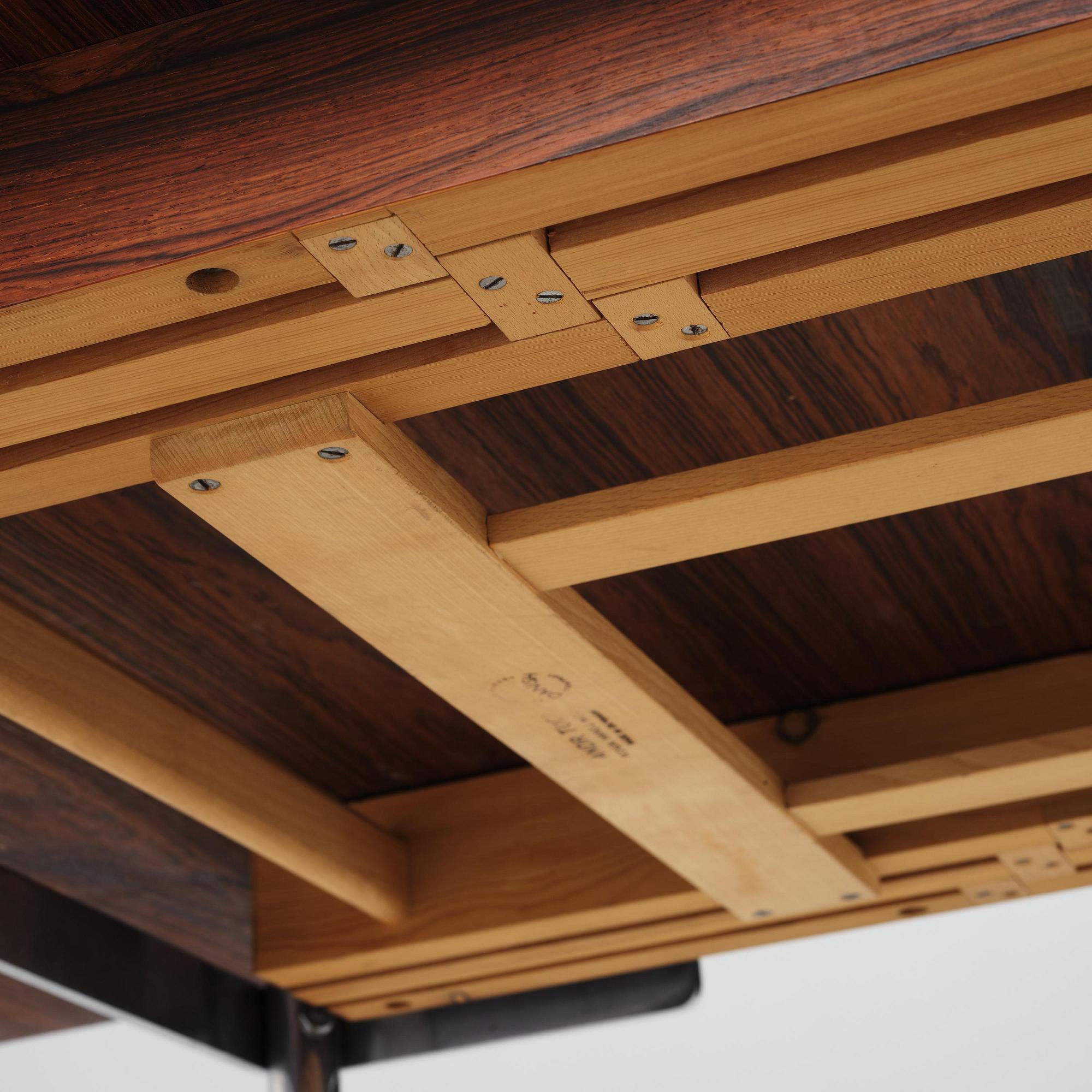 Hans J. Wegner, a rosewood "AT-322" table, Andreas Tuck, Denmark, 1960s.