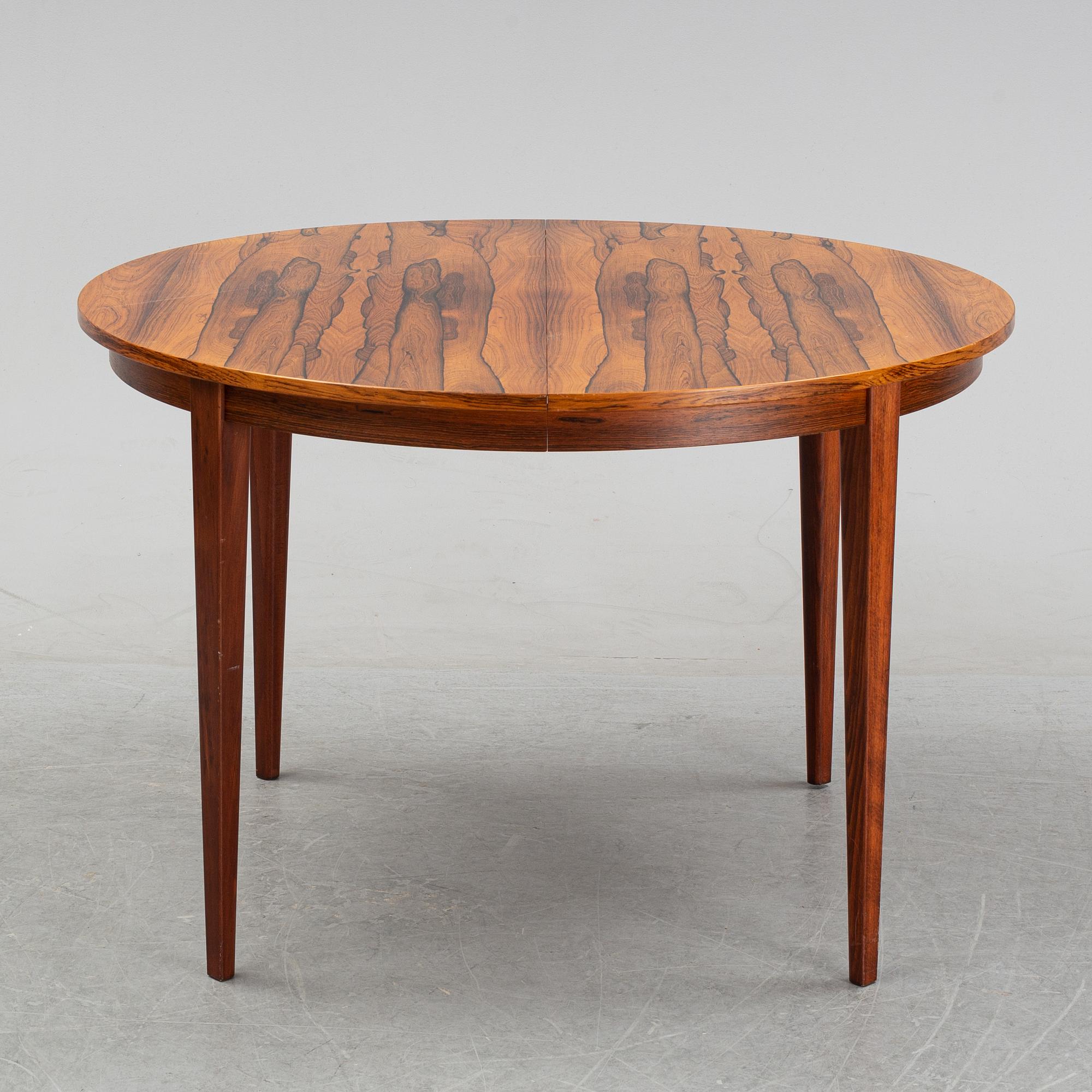 A rosewood dining table, 1970's.