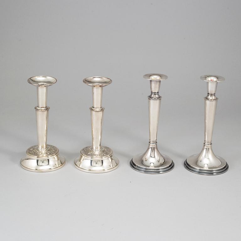 Four silver candlesticks from TESI, Gothenburg, 1972-74.
