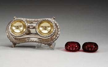 A Russian mid 19th century parcel-gilt and glass salt, makers mark of Nicols & Plinke, St. Petersburg. Imperial Warrant.