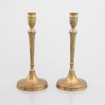 Skultuna Messingsbruk, a pair of 'N 55' brass candelabra, second half of the 19th Century.