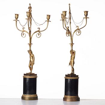 A pair of late Gustavian three-light chandeliers, circa 1800.