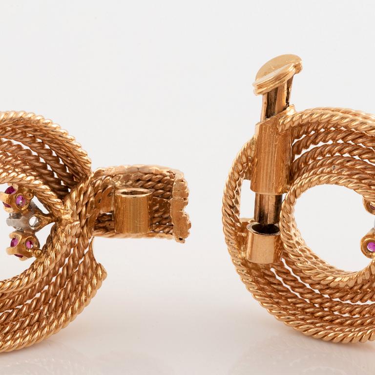 Armband 18K guld med runda briljantslipad diamanter och rubiner.