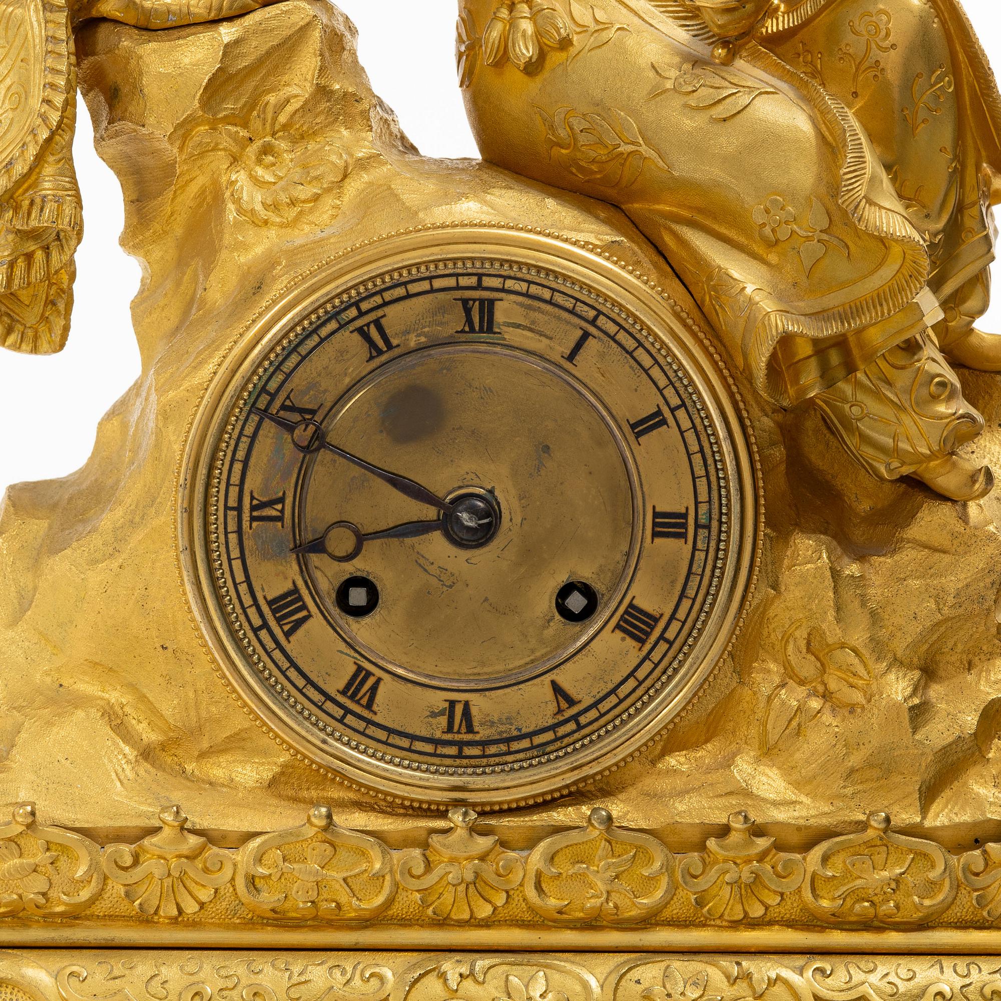 A Late Empire table clock, 19th century.