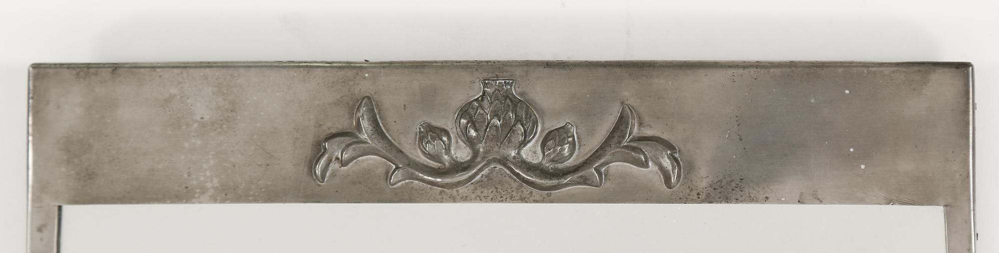 SPEGEL, tenn, 1900-talets mitt.