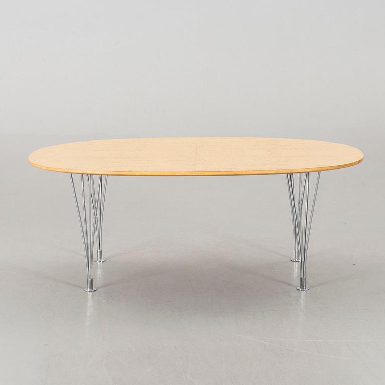 An end of th 20th century coffee table by Bruno Matsson & Piet Hein.