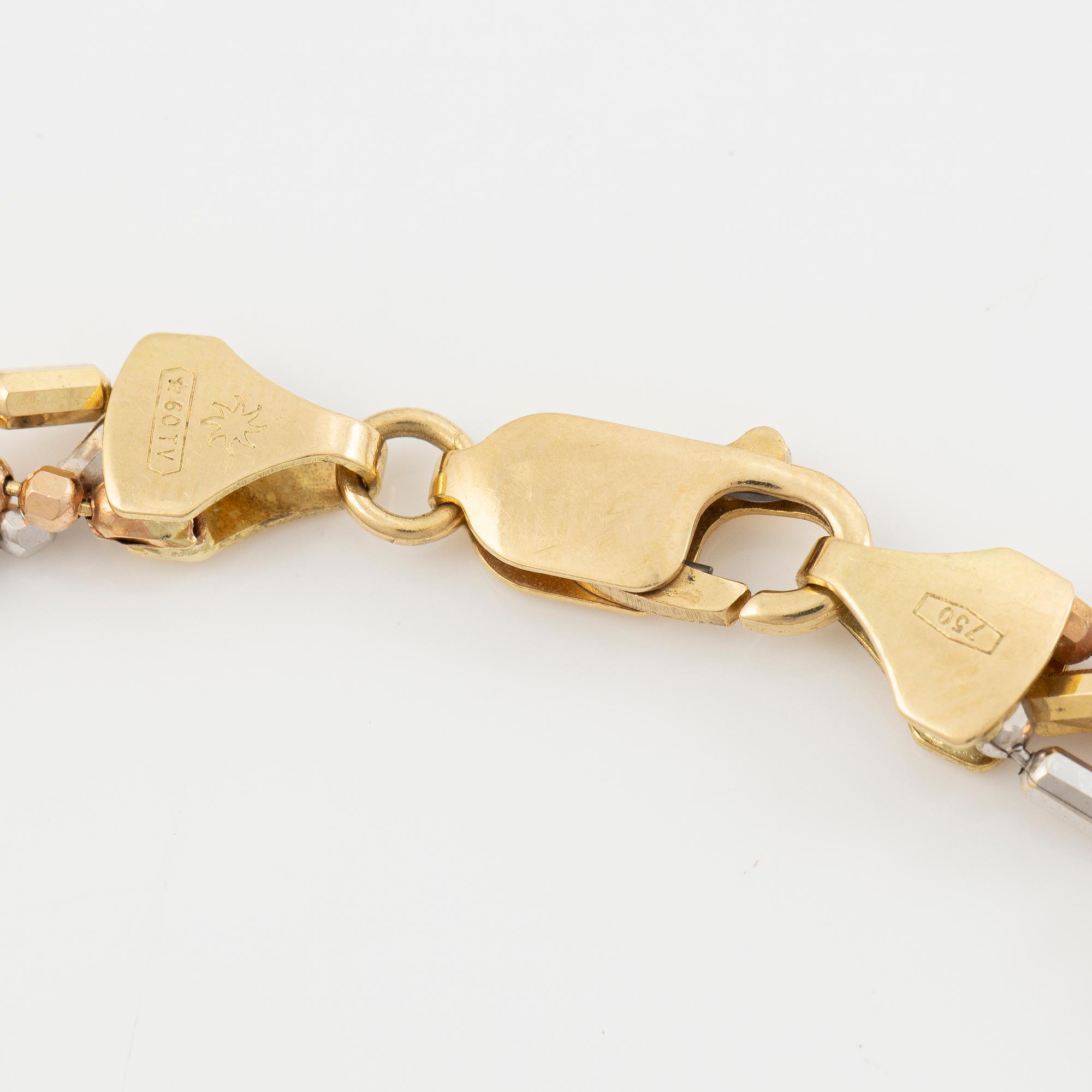 Necklace and bracelet in 18K gold and white gold.