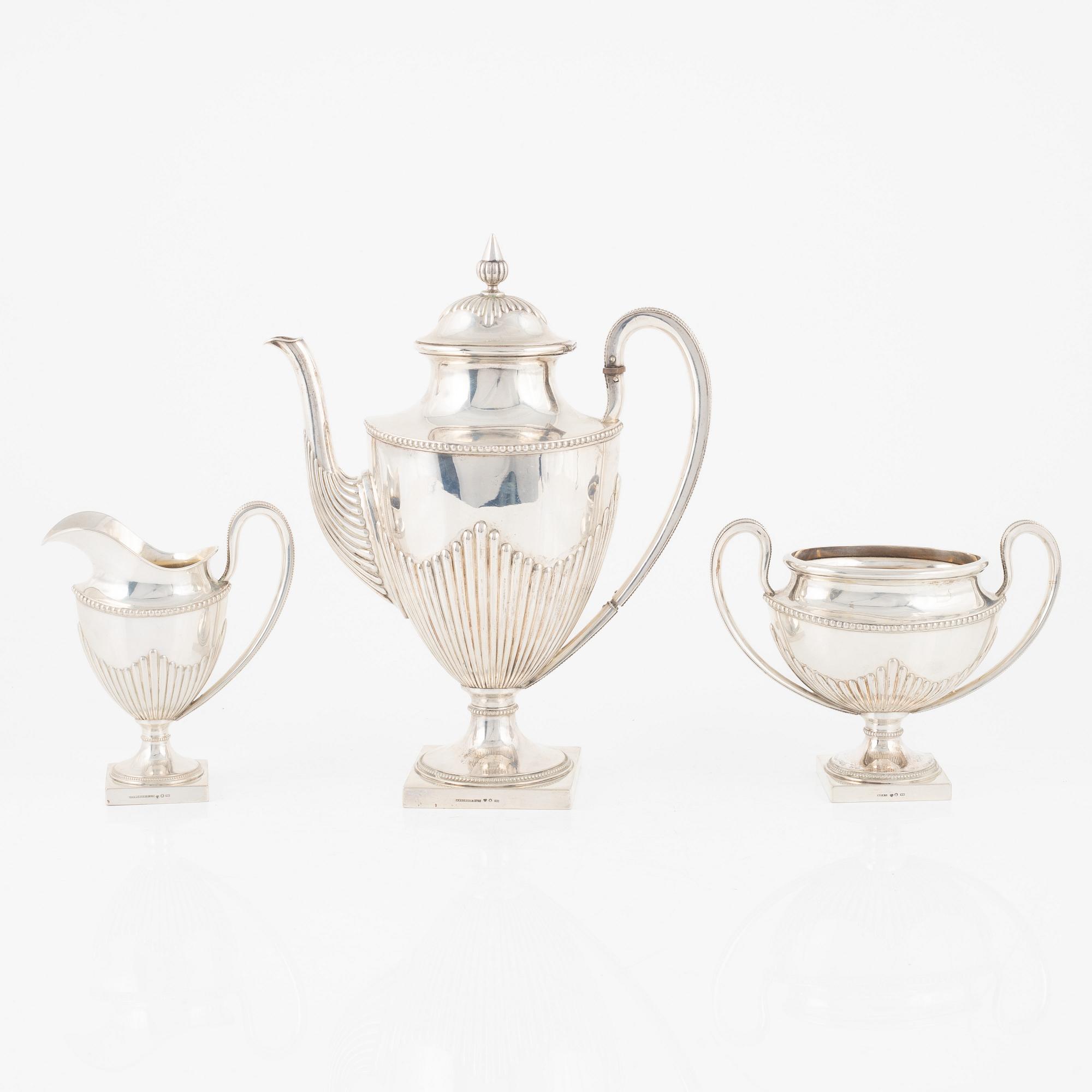 A Swedish Silver Coffee Pot, Creamer and Sugar Bowl, mark of Ludvig Axelson Jr, Stockholm 1899.