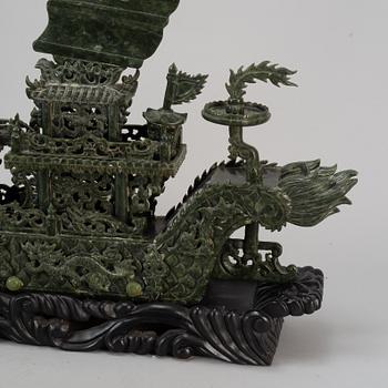 A large Chinese green stone carved sculpture, 20th century.