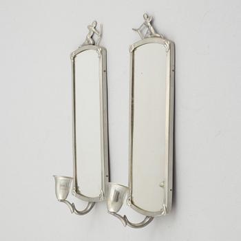 A mirror and a pair of wall sconces, 1920's/30's.