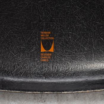 A 'Rocket chair' by Charles & Ray Eames, Herman Miller, late 20th century.