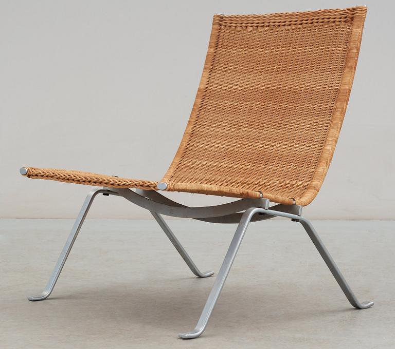 A Poul Kjaerholm steel and ratten 'PK-22' easy chair, E Kold Christensen, maker's mark in the steel.