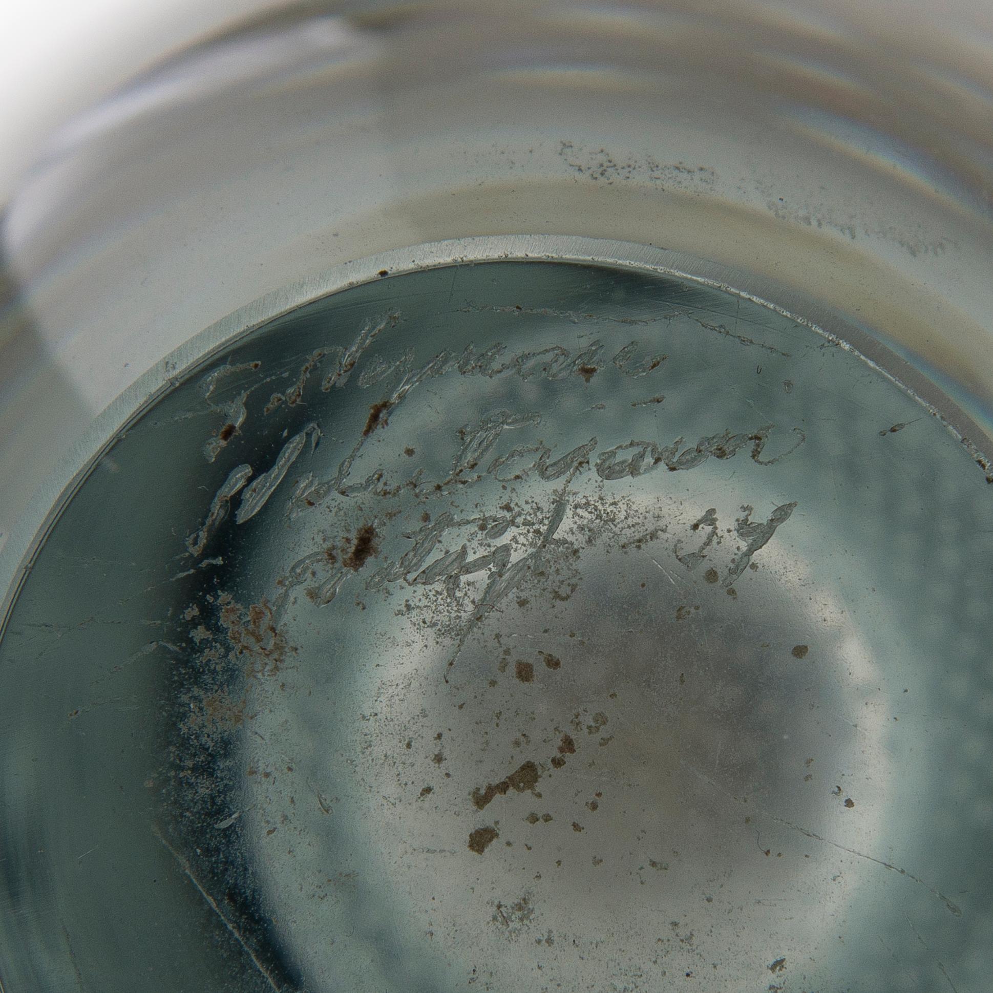 A glass vase signed G. Nyman, Nuutajärvi Notsjö -54.