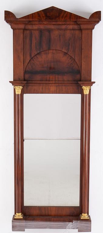 An Empire mirror and console table, first half of the 19th century.