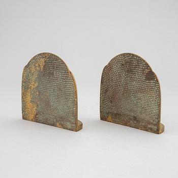 Simon Moselsio, a pair of bronze bookends, 20th Century.
