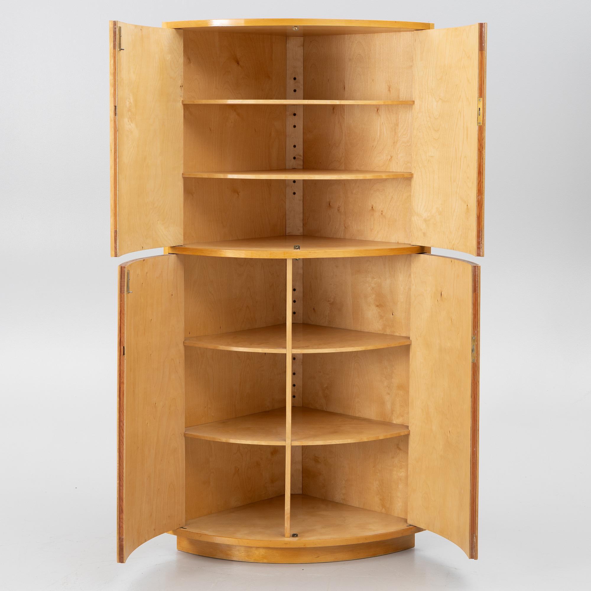 Corner cabinet, circa the mid-20th century.