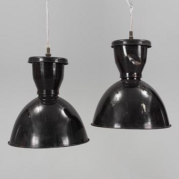 a pair of mid 20th century metal ceiling lights.