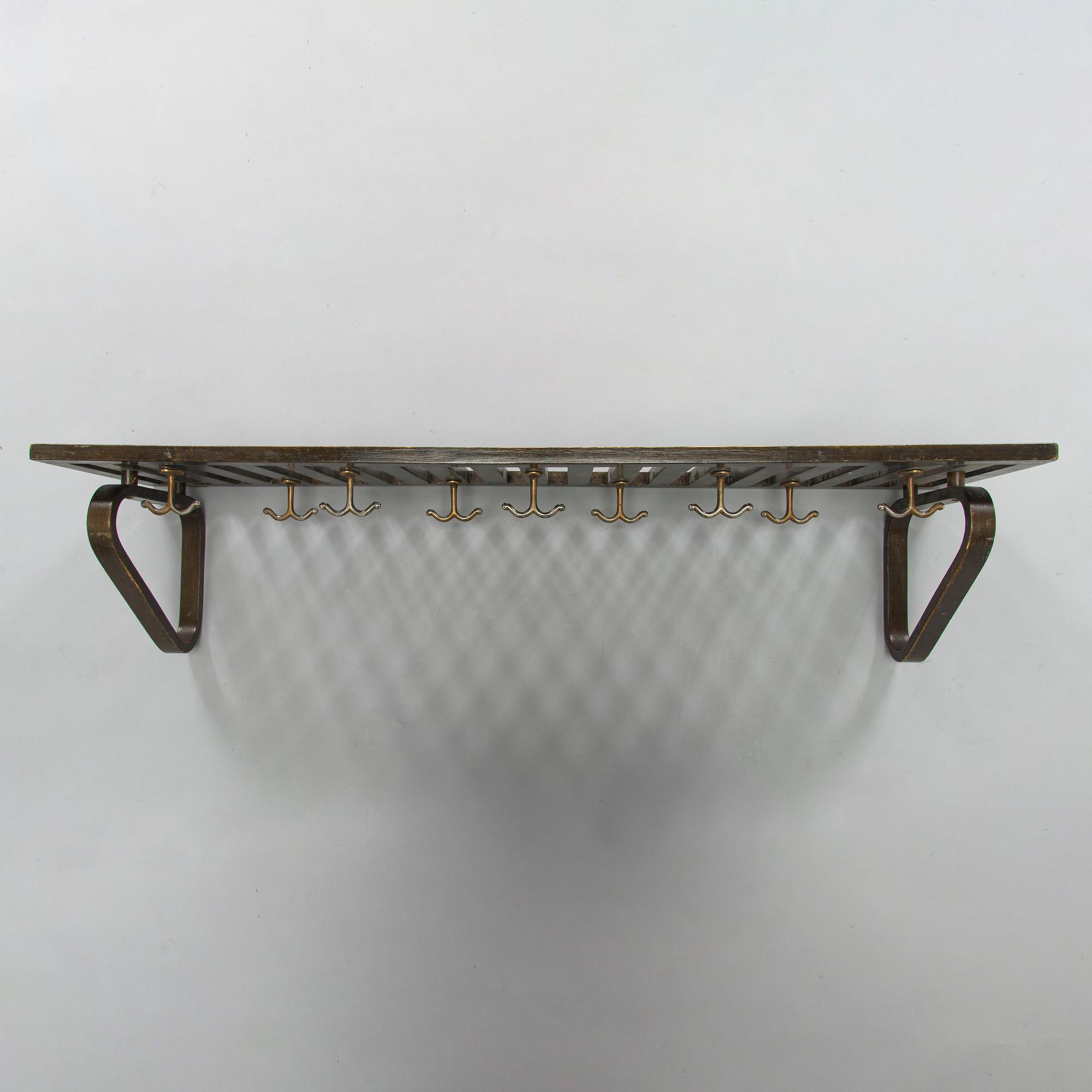 Alvar Aalto, hattuhylly / naulakko, malli 113, O.Y. Huonekalu-ja Rakennustyötehdas A.B. 1930-luvun alku.