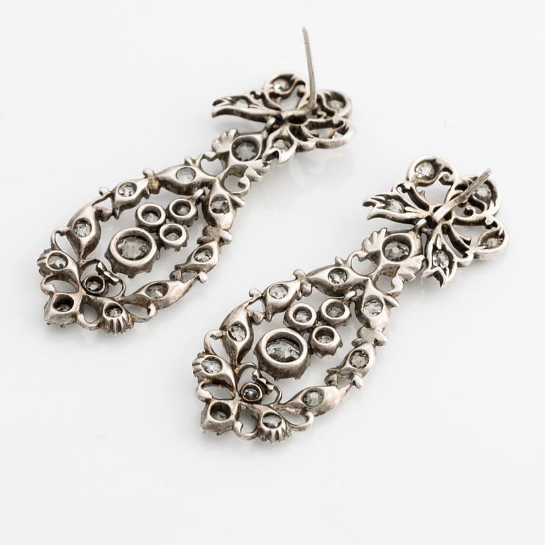 Earrings, one pair, silver with old-cut diamonds.