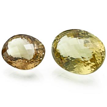 ÄDELSTENAR, 2 st, lemon quartz, 67.4 ct samt citrin, 31.55 ct, fasettslipade, 1900/2000-tal.