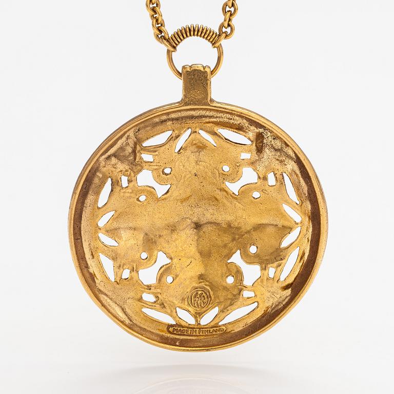 A gilded bronze neckalce "Åland pendant", model no. 67. Kalevala koru, Helsinki.