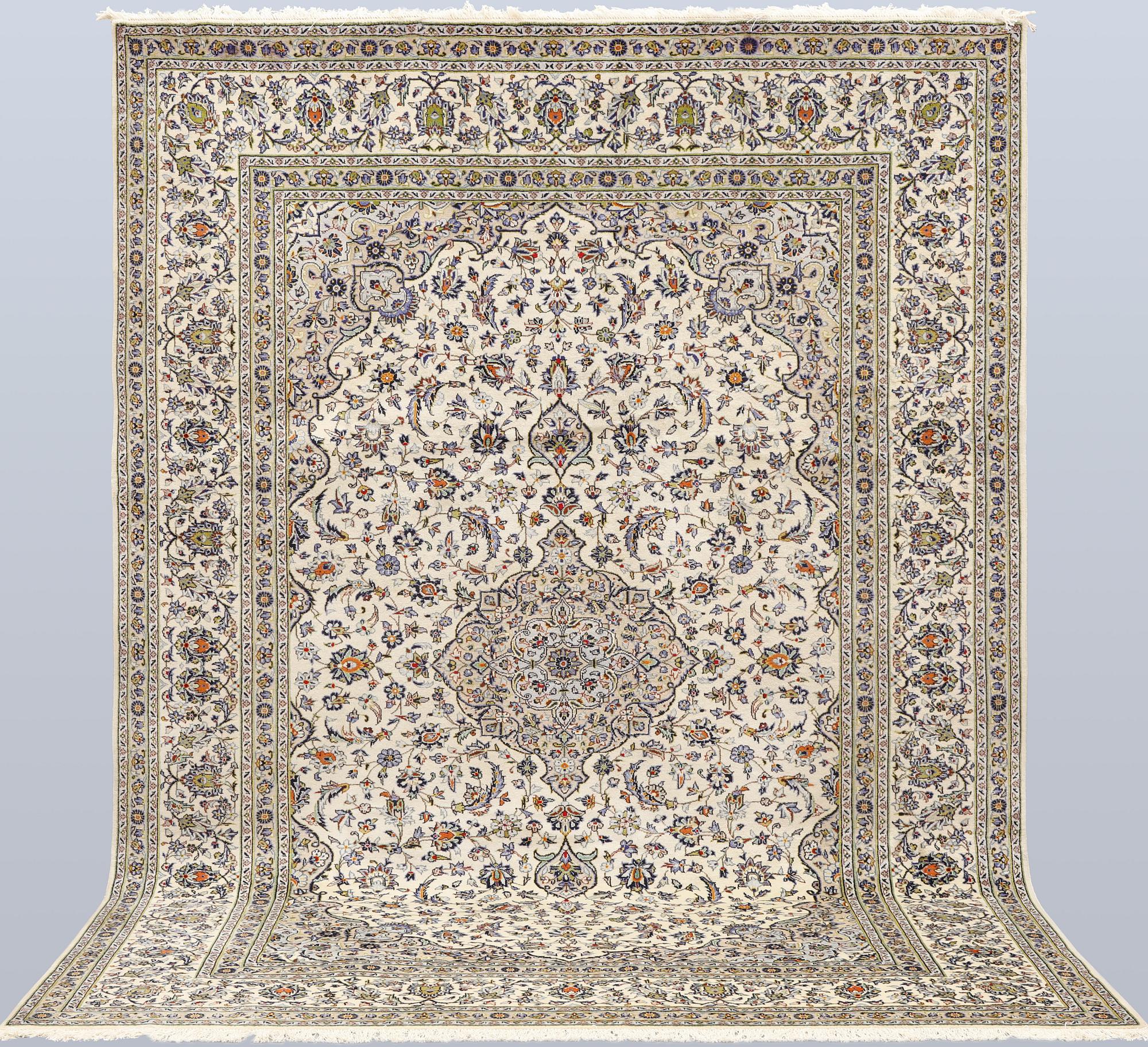A Keshan carpet, 355 x 260 cm.