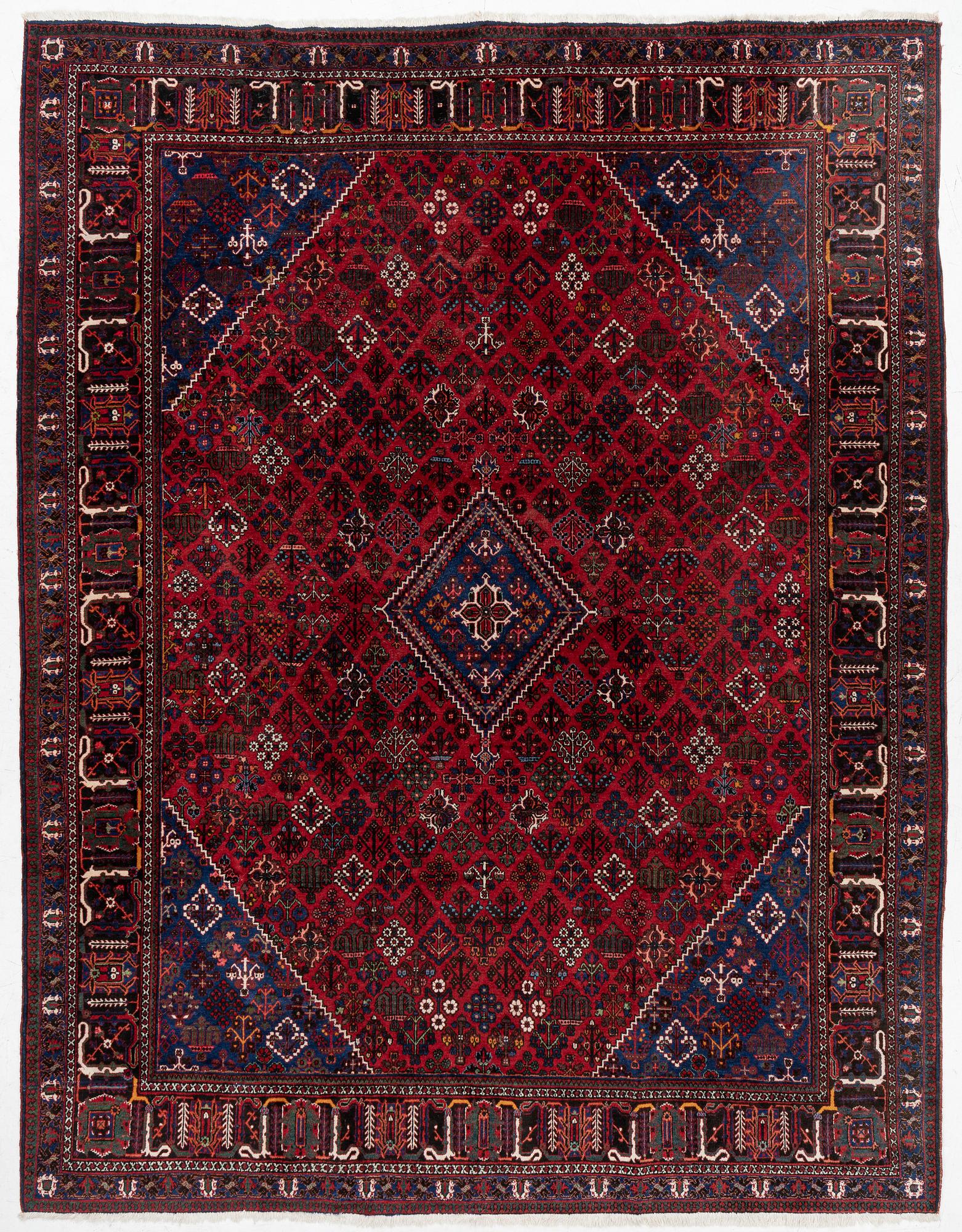 An oriental rug, c. 365 x 285 cm.