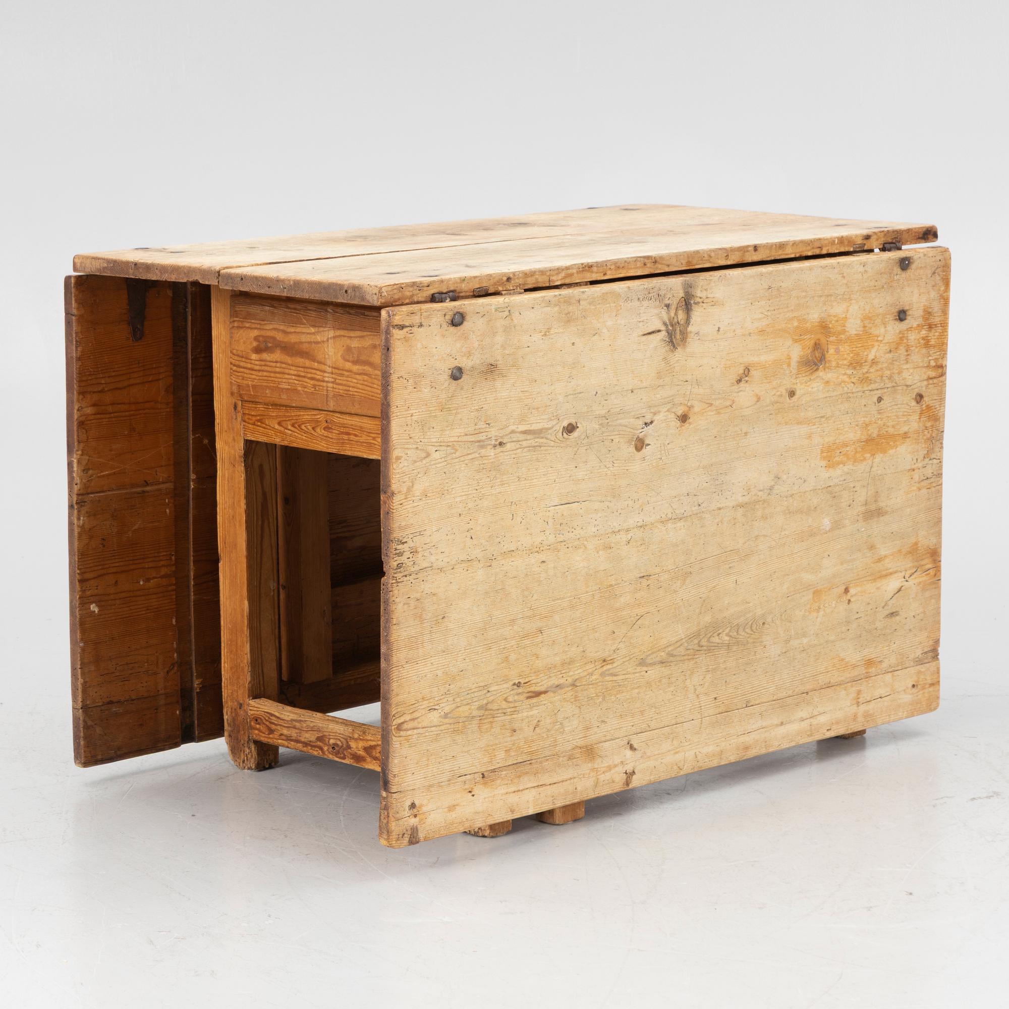 A 19th century gate-leg table.