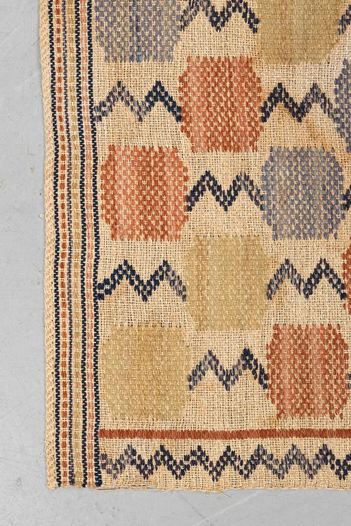 Märta Måås-Fjetterström, A textile, "Skaftblomman", flat weave, ca 131,5 x 47 cm, signed MMF.