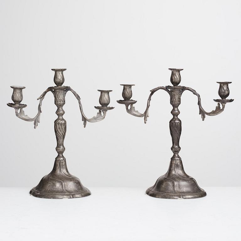 A pair of Swedish Rococo pewter three-light candelabra by Anders Wetterquist, Stockholm 1774.