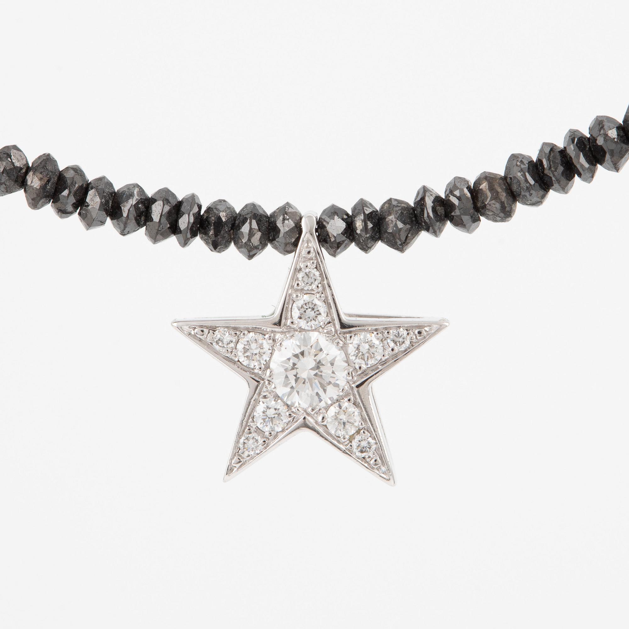 Necklace, Atelier Ajour, black diamonds with a star pendant set with brilliant-cut diamonds.