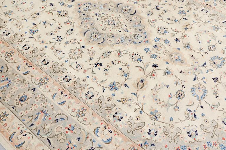 A Keshan carpet, c. 358 x 247 cm.