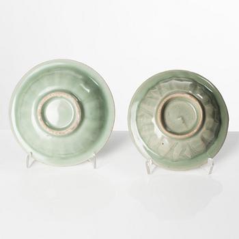 Two celadon glazed double fish dishes, Ming dynasty (1368-1644).