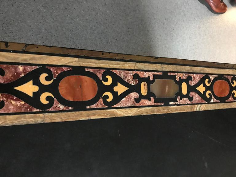 A pietre dure top, Italy, circa 1900, probably Rome or Naples. The stand in Louis XIV-style.