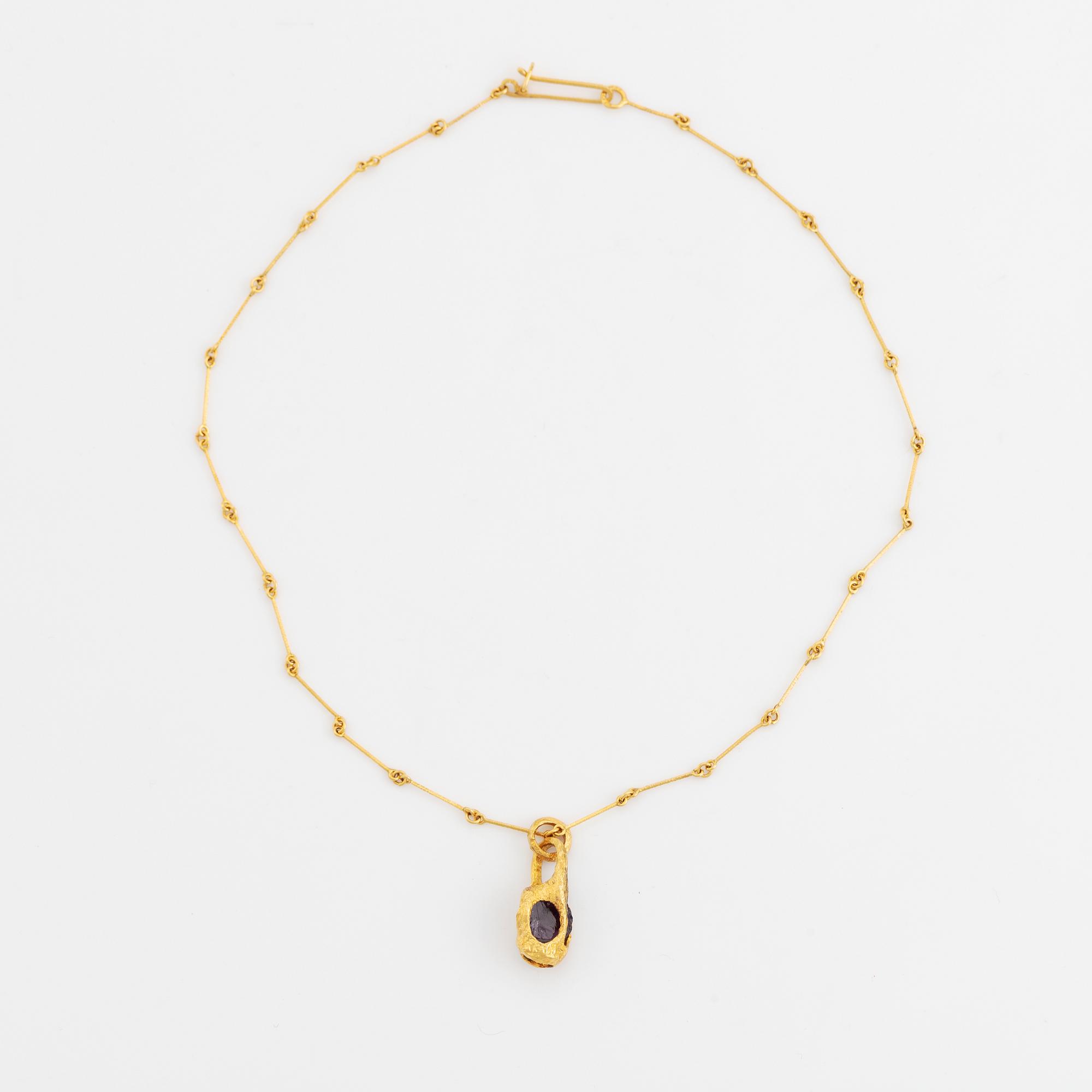 Björn Weckström, hängsmycke med kedja, "Renklockan" 14K guld med ametist, Lapponia 1974 och 1975.