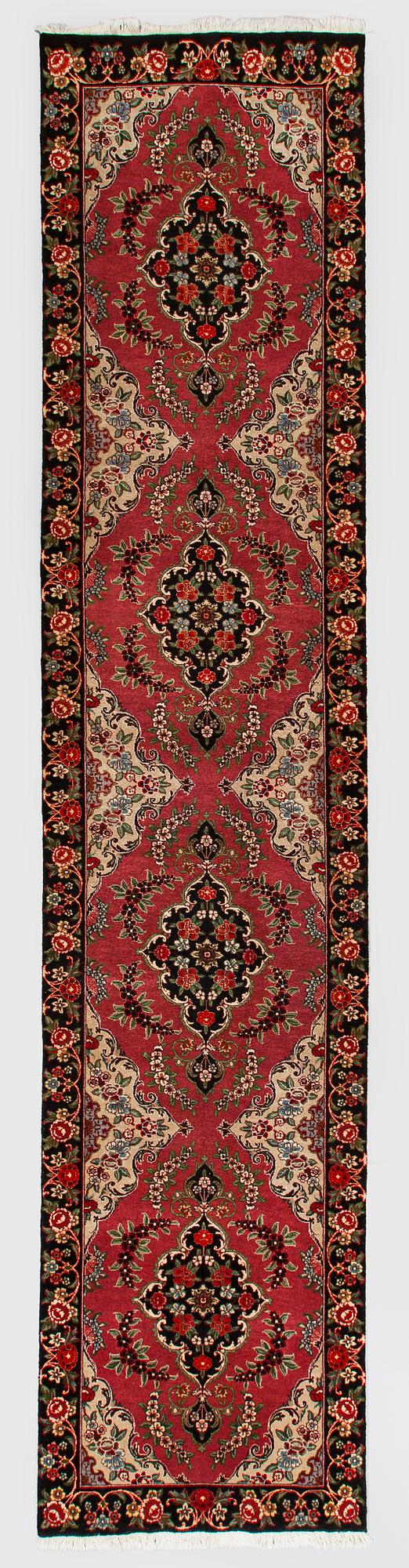 A runner, Tabriz part silk, so called 50 Radj. Ca. 400 x 90 cm.