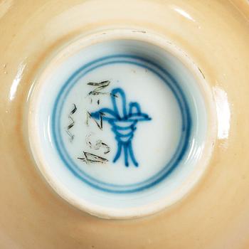 A blue and white/cafe au lait cup and saucer, Qing dynasty, Kangxi (1662-1722).
