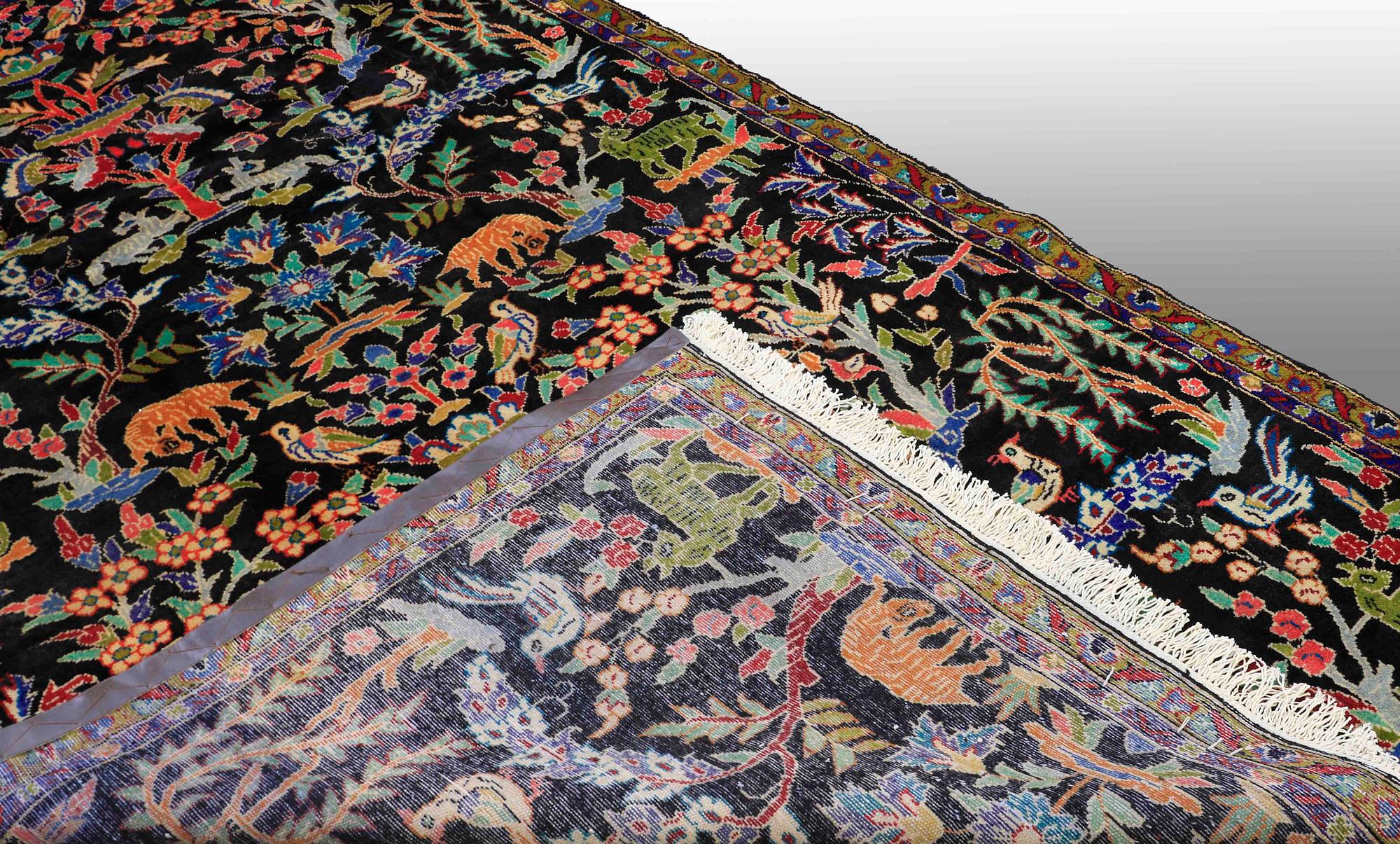 a Figural Fariden carpet (Esfahan area) 307 x 185 cm.