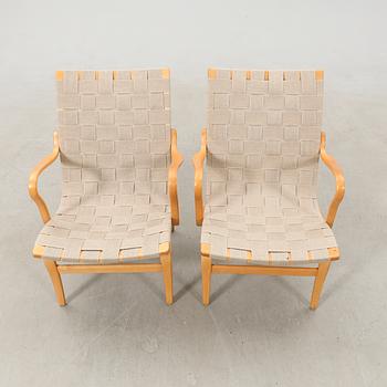 Bruno Mathsson, armchairs, a pair, "Eva", Firma Karl Mathsson, late 20th century.