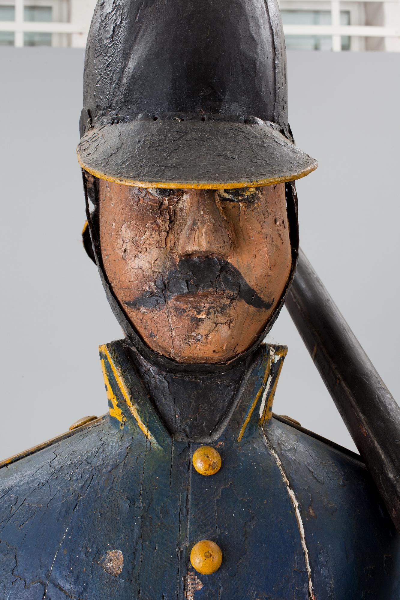 A Swedish 19th Century wooden sculpture.