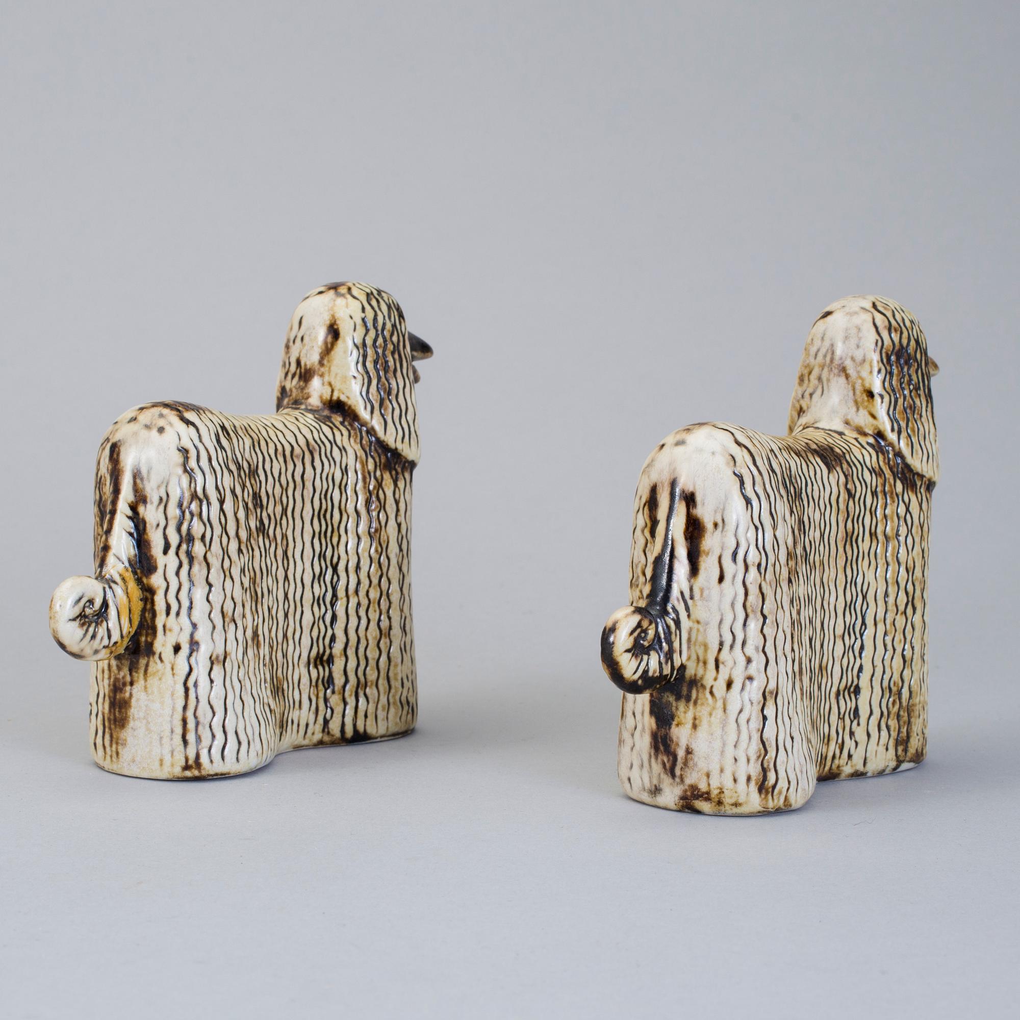 LISA LARSON, 2 st figuriner "Afghan", Gustavsberg, stengods. Ur serien "Kennel", formgiven 1972.