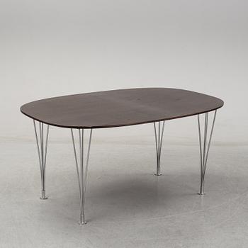 A 'Super-elliptical table by Piet Hein & Bruno Mathsson for Fritz Hansen.
