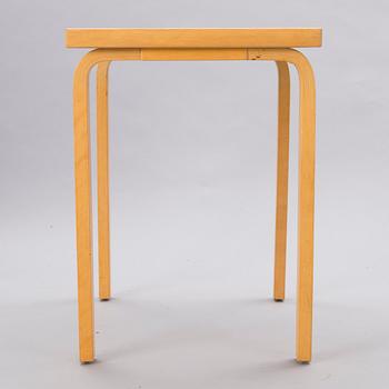 A mid-20th Century table, Artek.