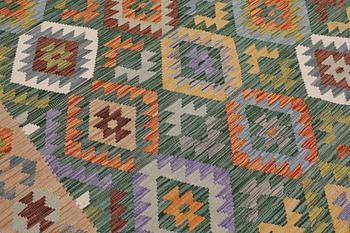 A Kilim carpet, approx. 290 x 250 cm.