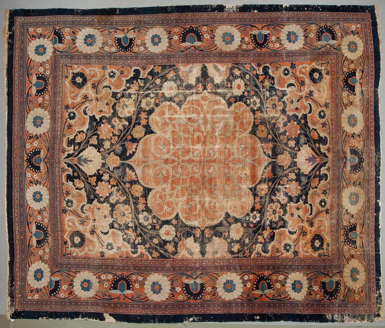An antique Persian Doroshk carpet, signed, ca 475 x 397 cm.