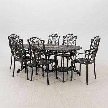 A seven pcs metal garden suit later part of the 20th century.