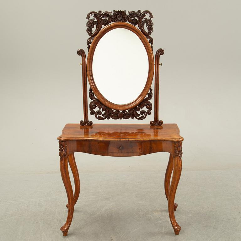 A rococo style dressing table, 19th Century.
